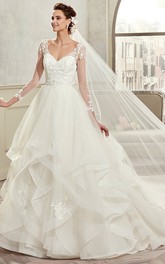 elegant Plunged Illusion Long Sleeve Organza Wedding Gown With Cascading Ruffles 